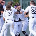 Rockies rally twice to drop Orioles in extras